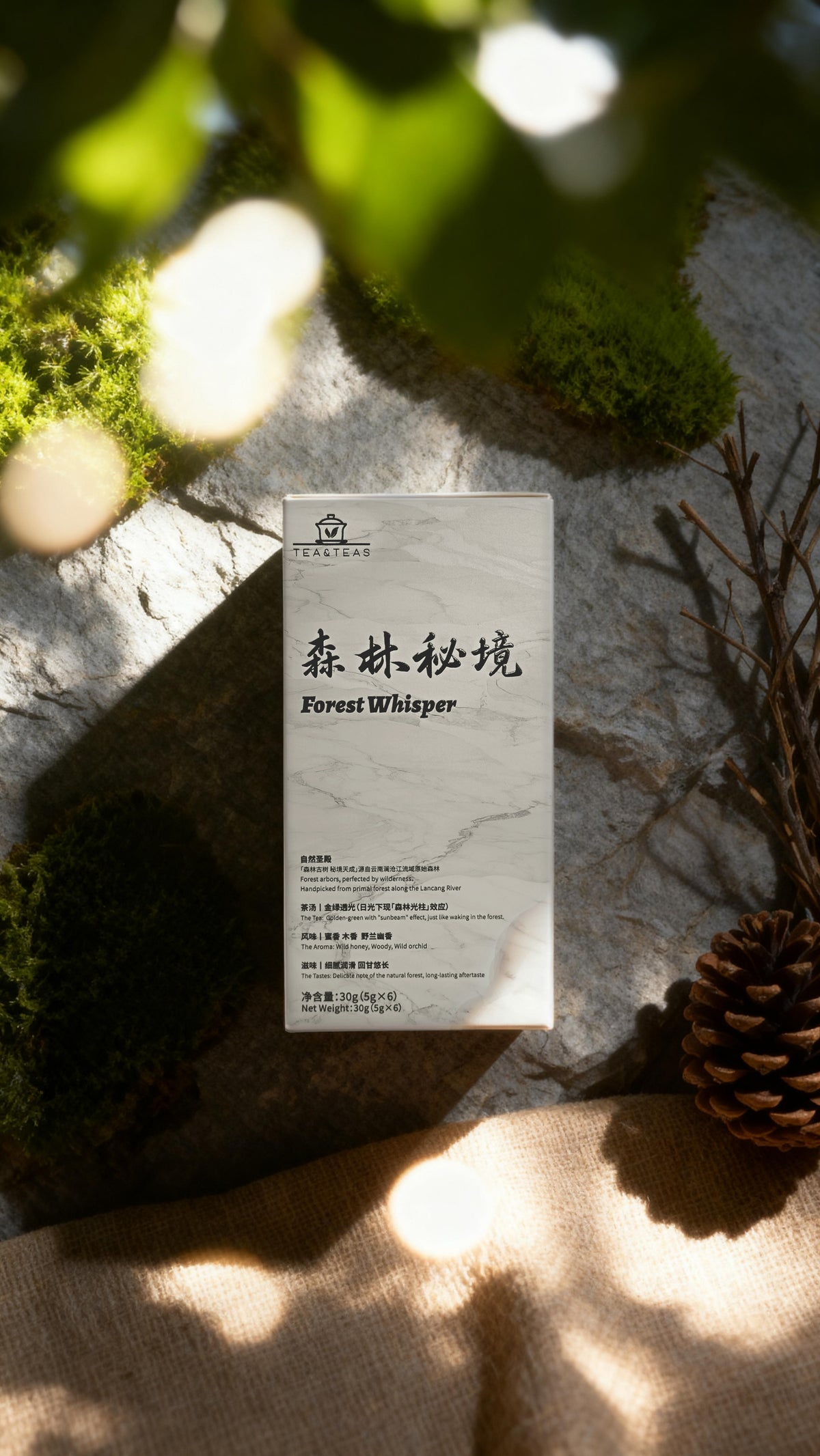 Product packaging labeled 'Forest Whisper' on a natural background with moss and pine cones.