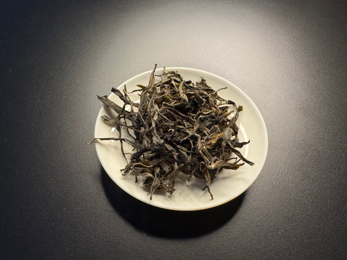 Tianjiao Daxueshan Ancient Tree Pu er Raw Tea (By TNTs)